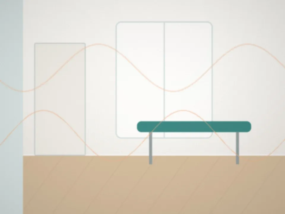 Cabine de soin calme et fermée, avec une table et une lumière douce