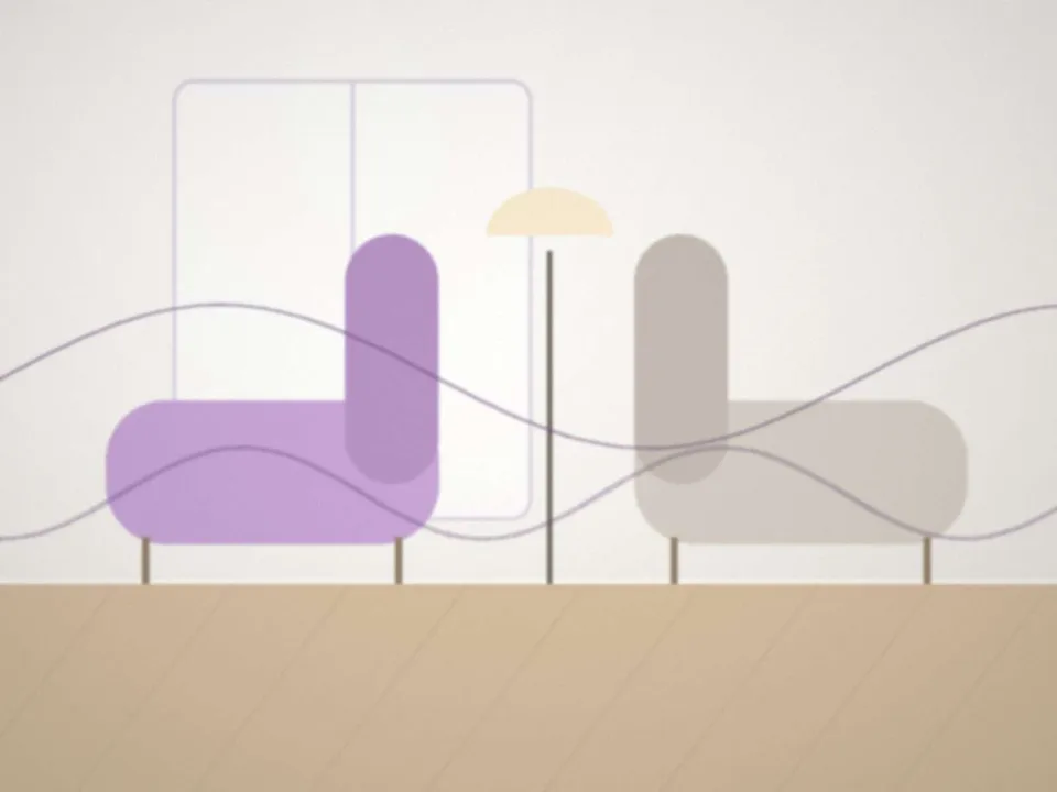 Un bureau de consultation avec deux fauteuils et une lampe douce