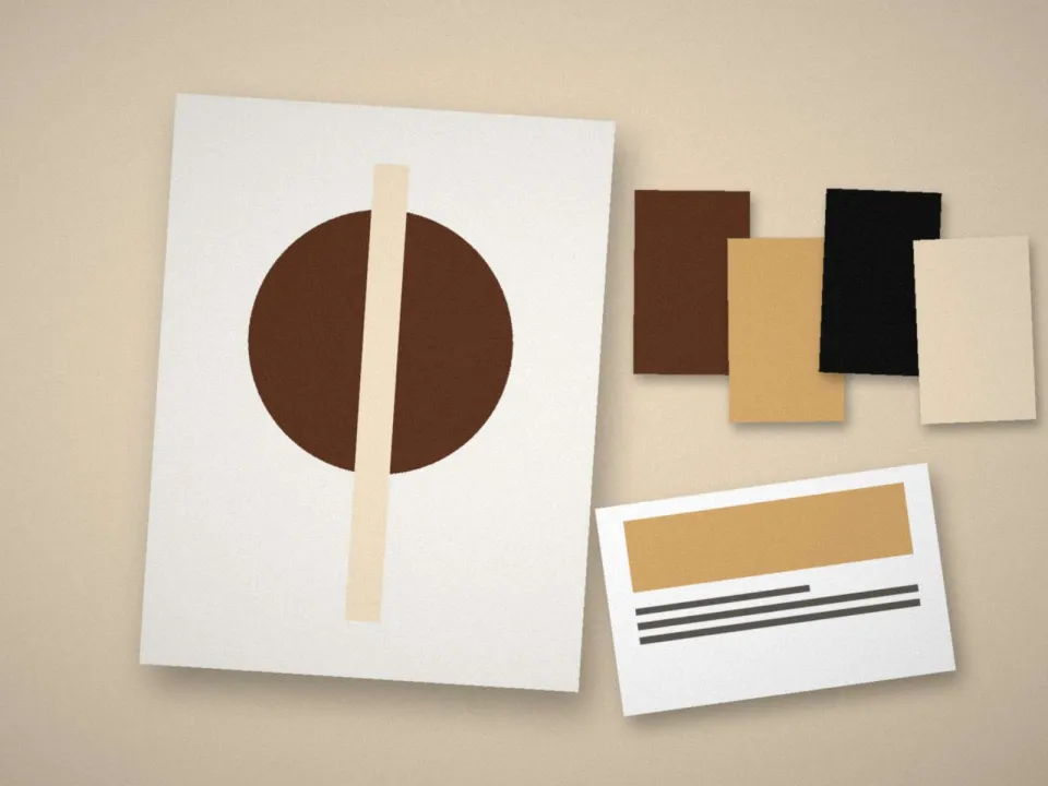 Recherches de logo et palette de couleurs imprimées sur une table