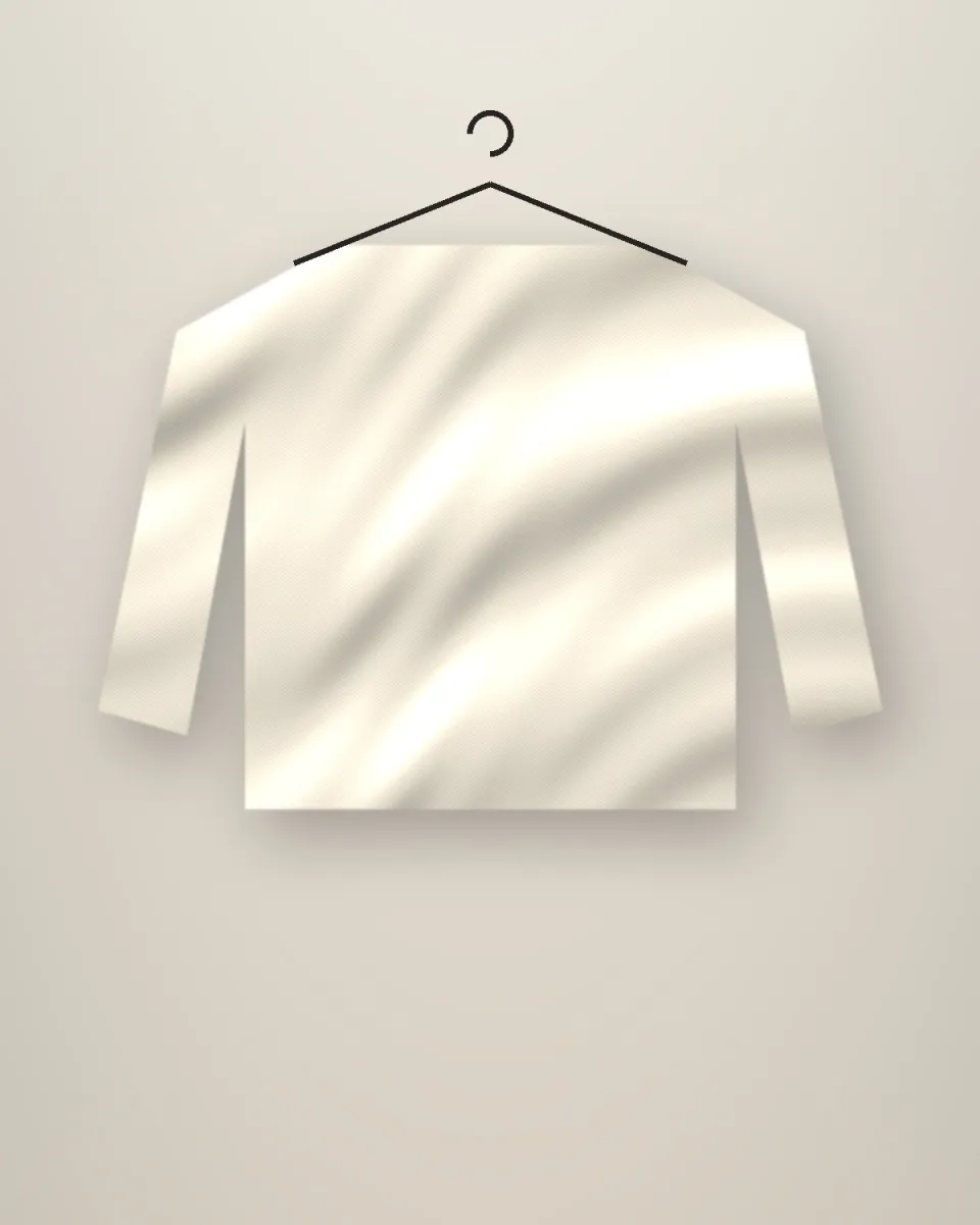 Pull en maille écrue sur cintre