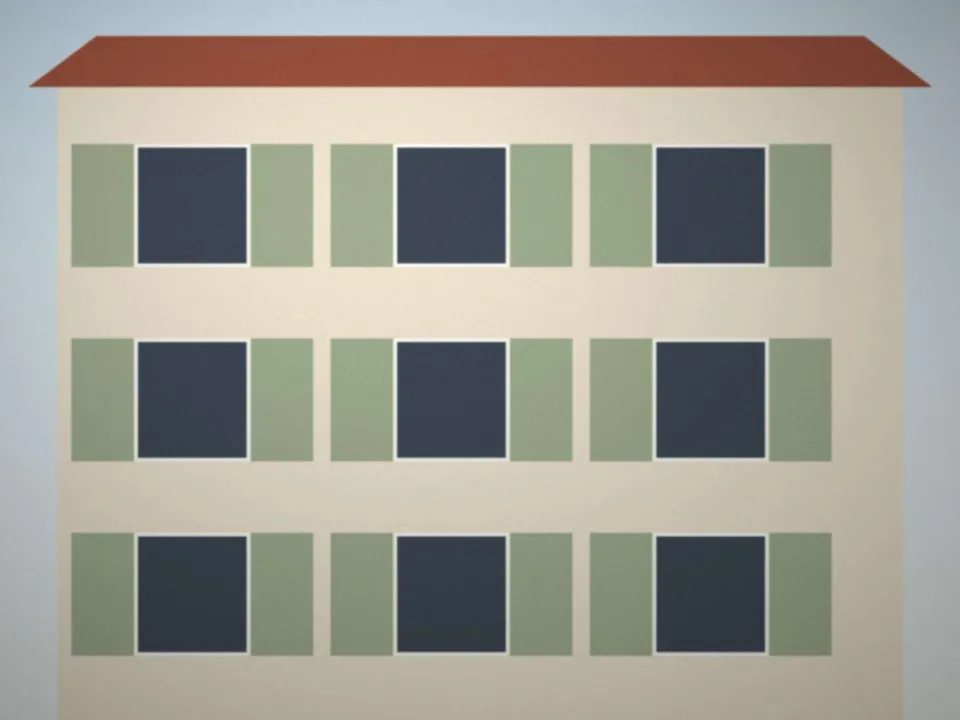 Façade d'immeuble ravalée avec volets vert sauge