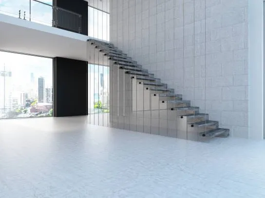 Grand carrelage de sol gris effet béton dans une pièce de vie