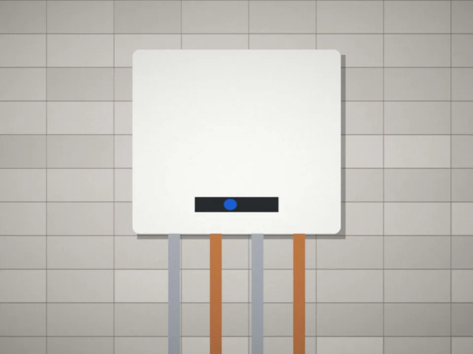 Chauffe-eau neuf installé dans une buanderie