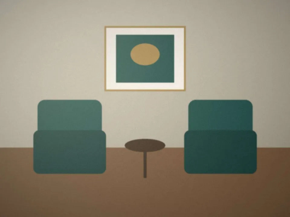 Salle de rendez-vous calme, deux fauteuils face à face
