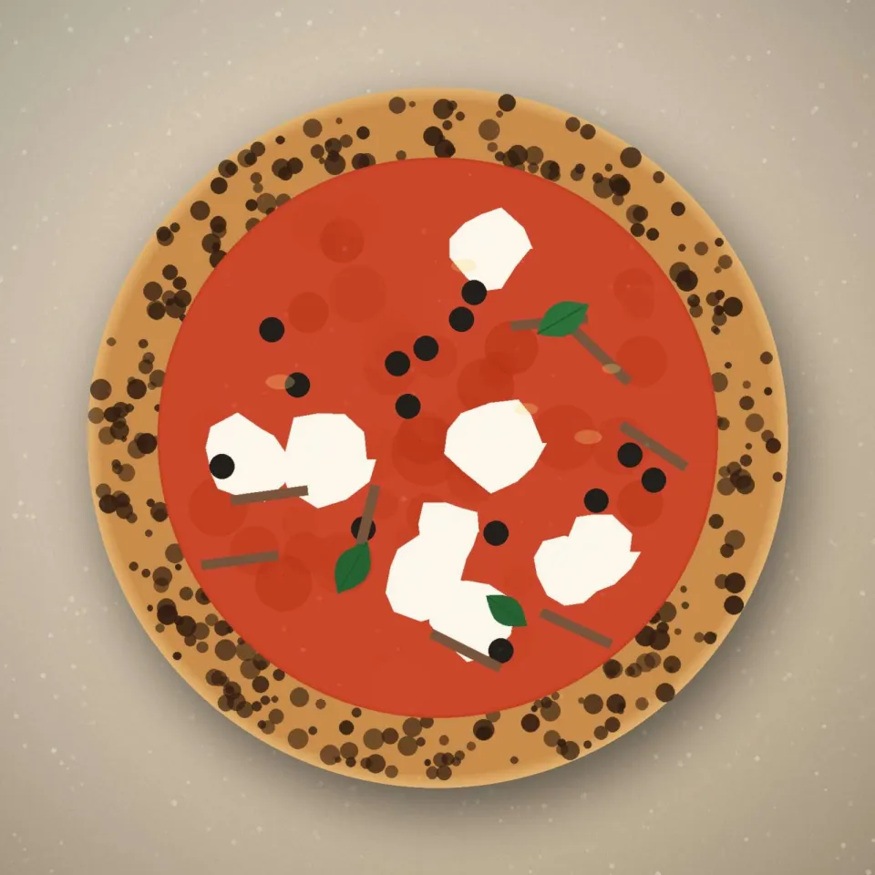 La pizza du mois aux olives noires et aux anchois, sur un plan fariné