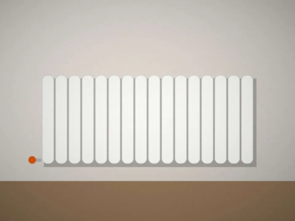Radiateur en acier sous une fenêtre de salon
