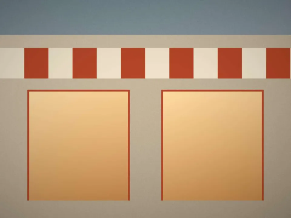 La devanture de la crêperie, avec son store rayé et ses deux vitrines