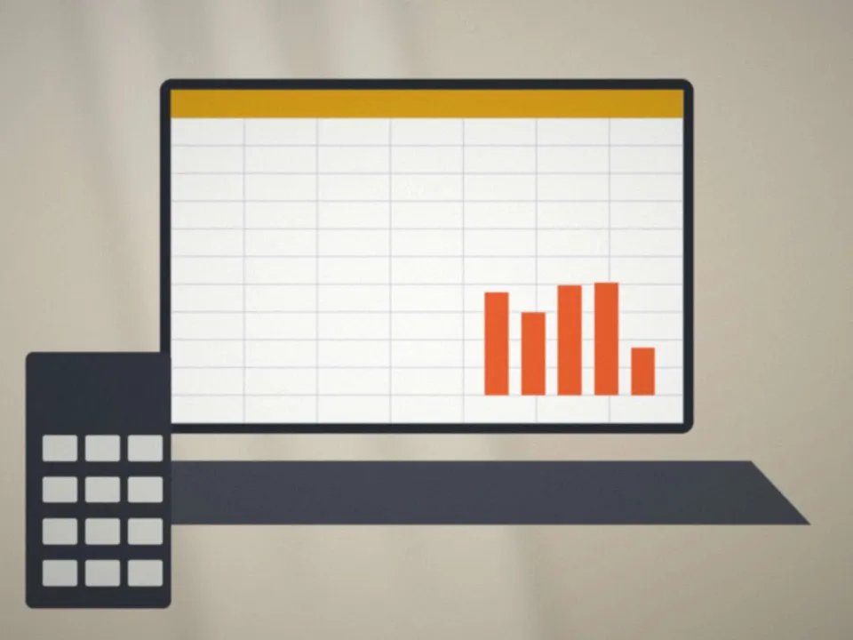 Carnet de comptes, calculatrice et tableau de bord imprimé sur un bureau