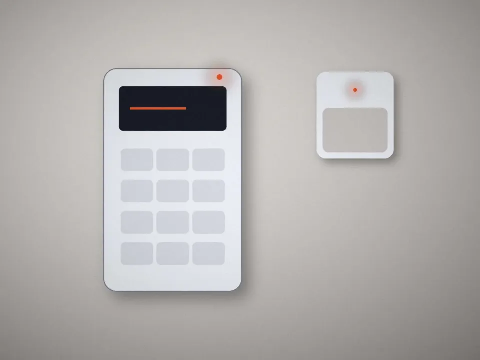 Clavier de commande d'alarme et détecteur de mouvement posés au mur