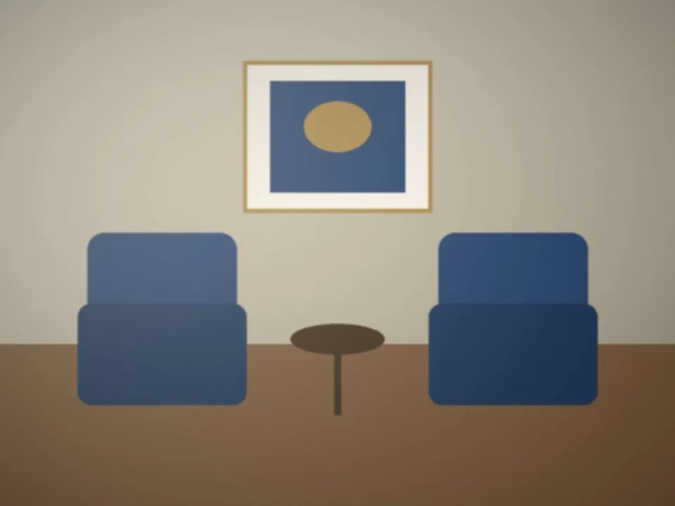 Salle de signature calme, fauteuils autour d'une table