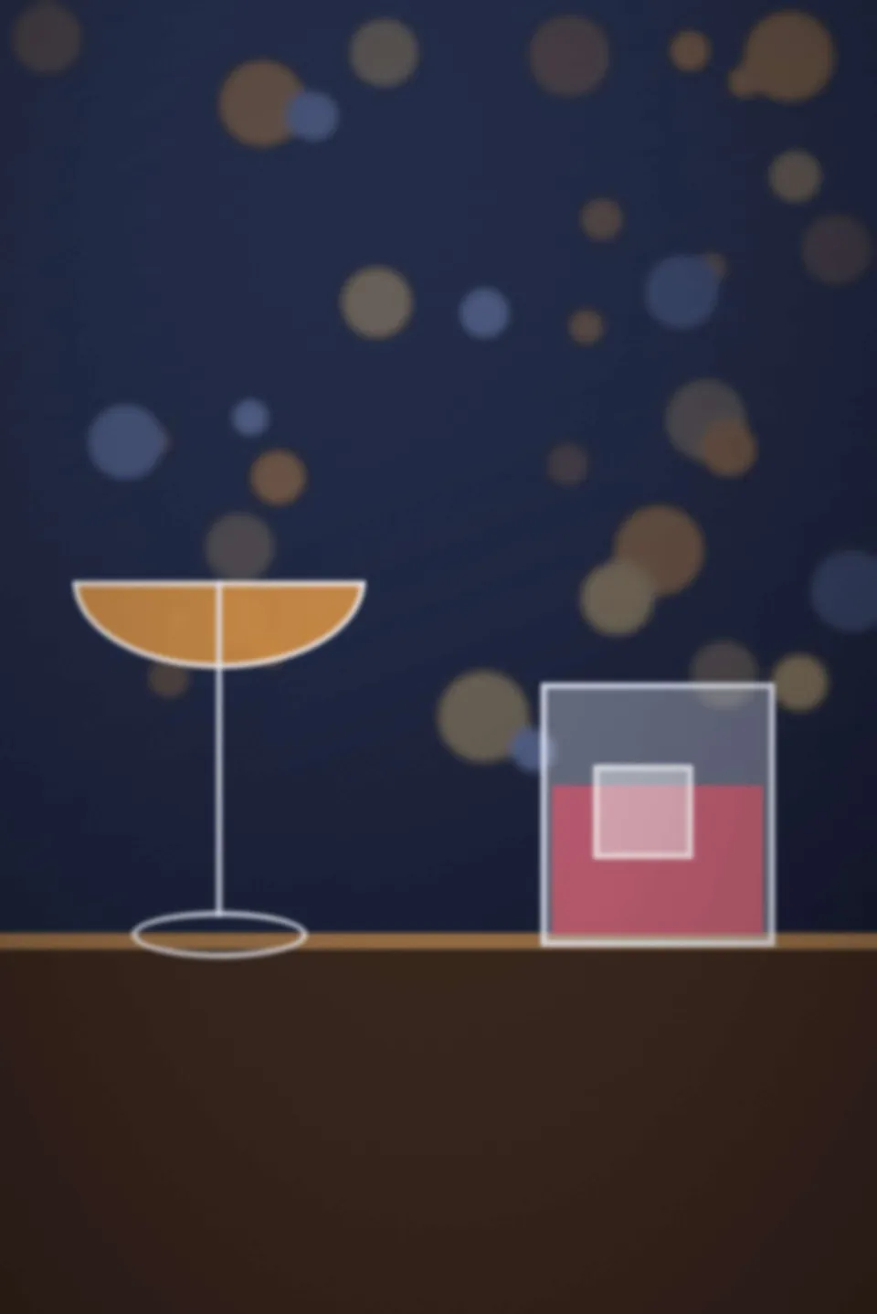 Table basse avec deux cocktails et une bougie